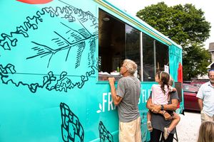 customer at the frankies truck at Frankie's Market in Vineyard Haven