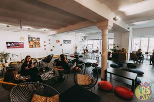 Upstairs floor ART, serving as a more intimate seating area, a small gallery, and an aperitivo bar on the weekends. at Pop'n'Art in Lodz