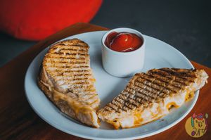 Our double cheese toasties are legendary thanks to our homemade toast bread, but you can also have them vegan way with two kinds of plant-based cheeses and soy-mayo inside! at Pop'n'Art in Lodz