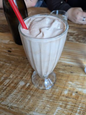 Coconut milk milkshake with chocolate syrup at Bareburger in Mount Kisco
