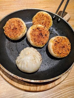 Pan fried dumplings! at Qīng Chún 庆春食堂 - Qingchun E Rd in Hangzhou