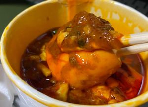 Mantou dipped in chilli crab sauce  at Greendot 绿一点 - Bishan in Central Singapore