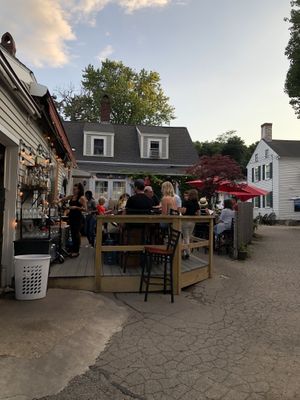 Bar and outdoor seating in back at La Orilla in Ogunquit