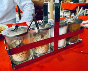 Peanuts, sugar and chili flakes at P & T Hostel in Koh Samui