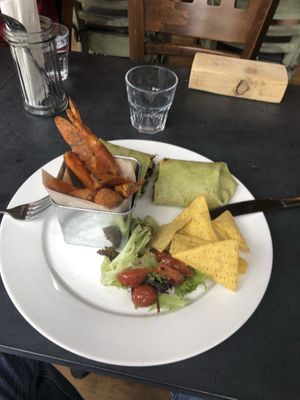Burrito and sweet potato wedges   at Greens Vegan in Cardiff