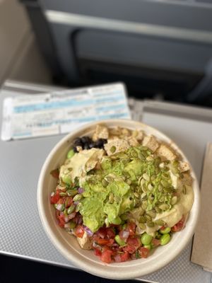 Delicious bowl with brown rice, black beans, tofu, edamame, pico de gallo, hummus AND guac - topped with pepitas!! So satisfying! Thanks PHL! ✈️🌱🙌 at PHL - Currito - TD in Philadelphia