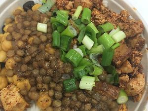 Create your own bowl w tofu, beans and lentils at PHL - Currito - TD in Philadelphia