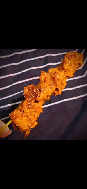 Chicken satay sticks at Vincent's Marketplace in Fitzroy