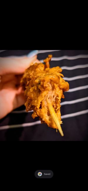 Chicken satay sticks at Vincent's Marketplace in Fitzroy