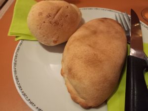 Empanada and cuñape (served with hot sauce) at Le Phare Cafe in Geneva