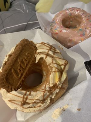 Vegan strawberry doughnut In the background  at The Oakleigh Doughnut Co in Oakleigh