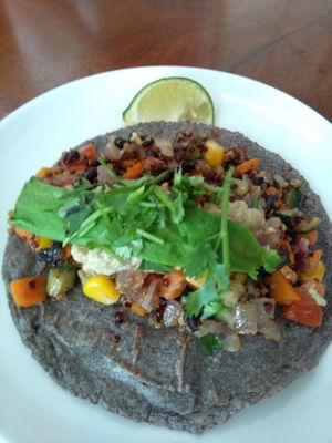 Vegan taco with beans and salsa and avocado sauce and some other ingredients  at Hanoi Taco Bar in Hanoi