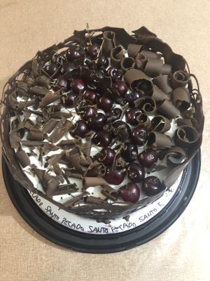 Pastel de “selva negra” relleno de mermelada, betún, cerezas y chocolate  at Santo Pecado Vegano in Mexico City