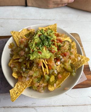 Nachos with guacamole, pico de gallo and jalapeños  at Surf House in Barcelona