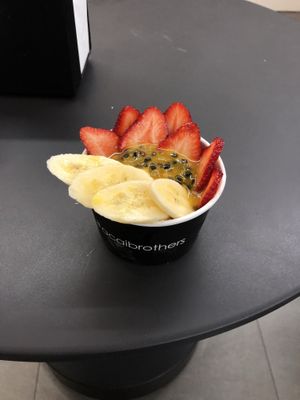 Mango and passion fruit acai bowl with fruit at Acai Brothers  in Canberra