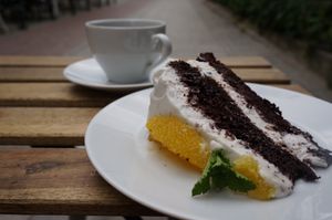vegan cake and black coffee at Umamitu by Papuvege in Lodz