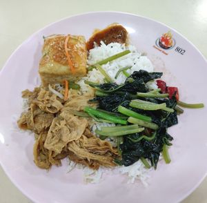 Rice with braised beancurd skin, sweet sour tofu and sweet potato leaves $3.50 at Kang Su Vegetarian 康素 - French Rd in Central Singapore