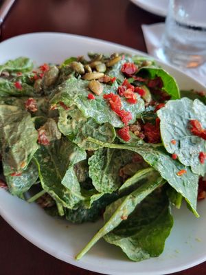 Kale Salad $17
Baby kale, marinated butter beans, sun-dried tomato, crispy chickpeas, pumpkin seeds, avocado, creamy pistachio dressing at Mews in Provincetown