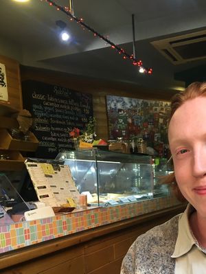 Menu in background x  at Falavela in Crete