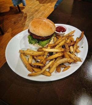 Nashville Hot Vegan Sandwich with Truffle Fries at Decades in Lancaster