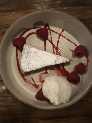 Orange cake with raspberries and dairy free ice cream  at Engine in Sowerby Bridge