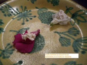Edible flowers with fermented almonds and marigold at Marco Vitale Chef in Florence