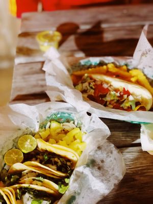 Al pastor tacos and bacon wrapped hot dog  at The Green Table in Victoria