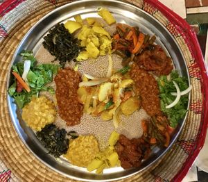 The ultimate combo with steamed potatoes added (center). So yummy!!! at Taste of Ethiopia in Pflugerville