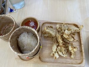 fried mushroom chicken with sticky rice  at Bai Plu House in Bangkok