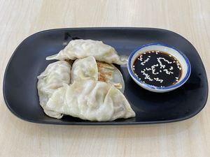 Gyoza, 69 baht (plus 7% tax)  at Bai Plu House in Bangkok
