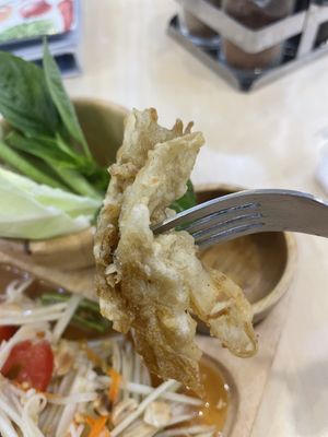 Deep fried mushrooms come with som tan  at Bai Plu House in Bangkok