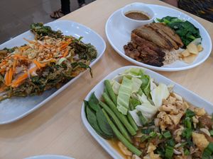 Duck, mashrooms and tofu dish and morning Glory salad. at Bai Plu House in Bangkok