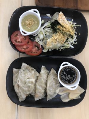 Gyoza and the spinach app. Both very good   at Bai Plu House in Bangkok