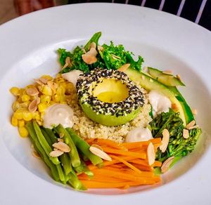 HARVEST BOWL  - quinoa, broccolini, kale, green beans, cucumber, corn, carrots, avocado, almonds, lemon-tahini dressing  
 at Sea Breeze Lounge in Hamilton