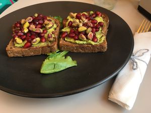 Avocado, pistachio and pomegranate toast at Art Cafe Bar in Bled