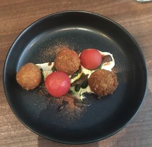 ARANCINI - TOMATO – RICOTTA – BLACK OLIVE at Land in Birmingham