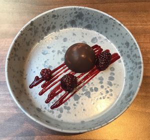 Chocolate mousse with beetroot sauce and macerated raspberries at Land in Birmingham