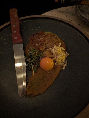 Suteki Tamago ("steak and egg") made with enoki mushrooms at Umami Ramen & Izakaya in Montreal