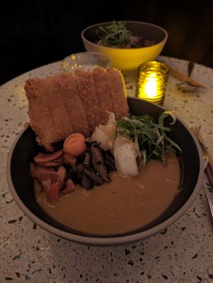 Curry and Tonkatsu Tempeh ramen at Umami Ramen & Izakaya in Montreal