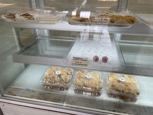 Chocolate baklava, and almond pistachio baklava on top, cake balls in middle, pumpkin spice baklava on bottom. at Nabati Vegan Mediterranean in Oklahoma City