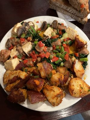 Tofu scramble with added vegan sausage   at Toast Coffeehouse in Bay Shore