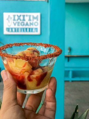 Un delicioso postre, helado de mango con chamoy y tajín at iXiMeek | Plant Based Project in Bucerias