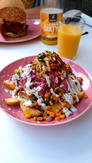 Loaded potatoes with bechamell sauce and tempeh 👌 at RoseHip Bistro - Pylimo in Vilnius