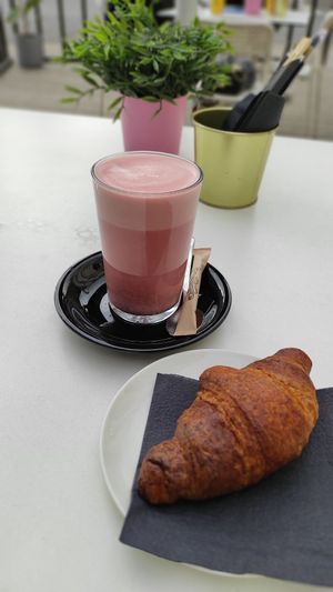 Beetroot latte and croissant 👌 at RoseHip Bistro - Pylimo in Vilnius