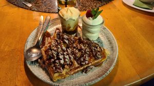 Vegetarian Waffles with nuts and ice and whipped cream at 2Stein in Krems An Der Donau