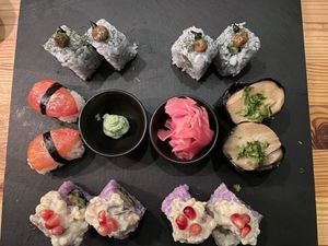 Second round of rolls (chefs special) the Gothic garlic (YES!) + our least favorite roll of the evening Purple rain (hummus and baba ganoush were fighting each other flavor wise) at Plant Based Sushi in Amsterdam