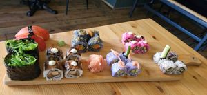 Chef's choice menu for 2. All 5 sushi rolls on a platter. at Plant Based Sushi in Amsterdam