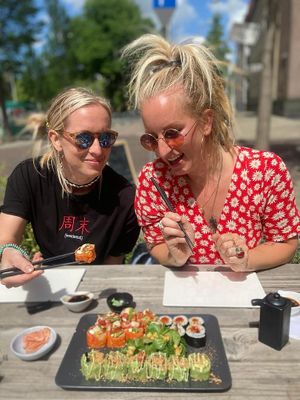 Customers enjoying our new sushi on the terrace in Amsterdam East at Plant Based Sushi in Amsterdam