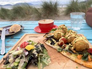 Falafel and flat white with oat milk  at Sammy's in Inch