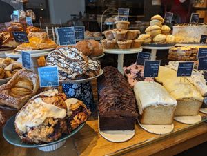 Vegan items are marked with a "V". They had two vegan scones and two vegan lemon pound cake options when we went at Purebread in Whistler